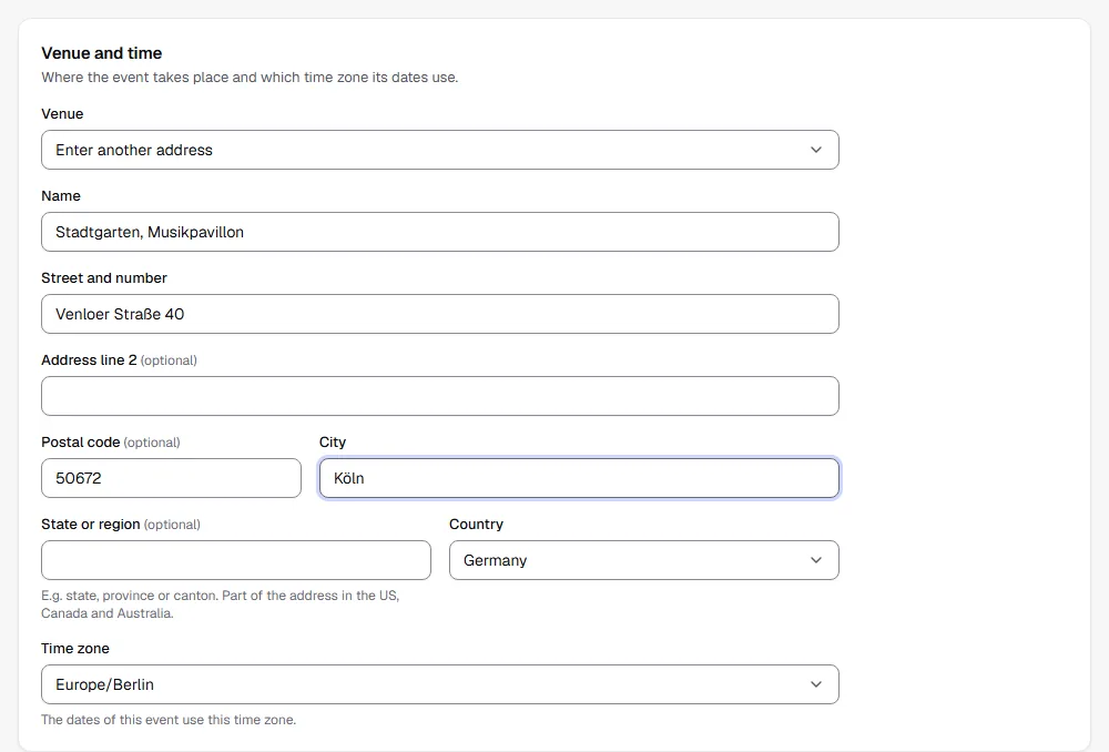 Venue and time section with Enter another address selected and fields for name, street, postal code, city, region and country